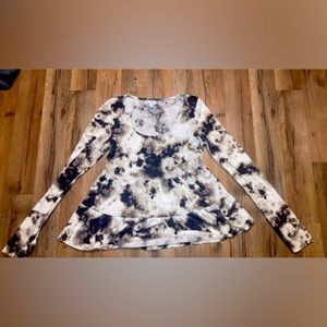 love fire brownish, white and black long sleeve shirt never worn.